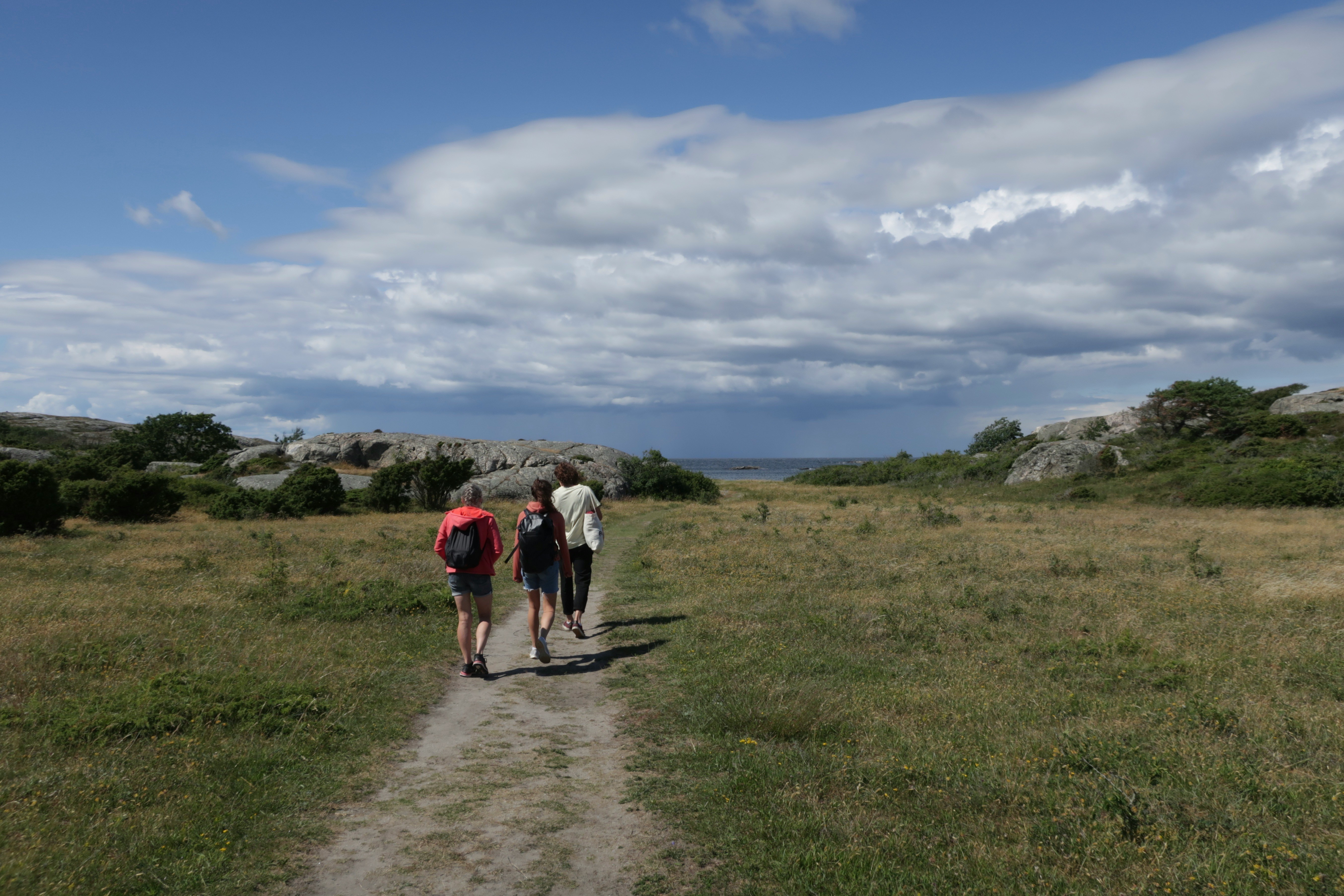 People walking along the countryside