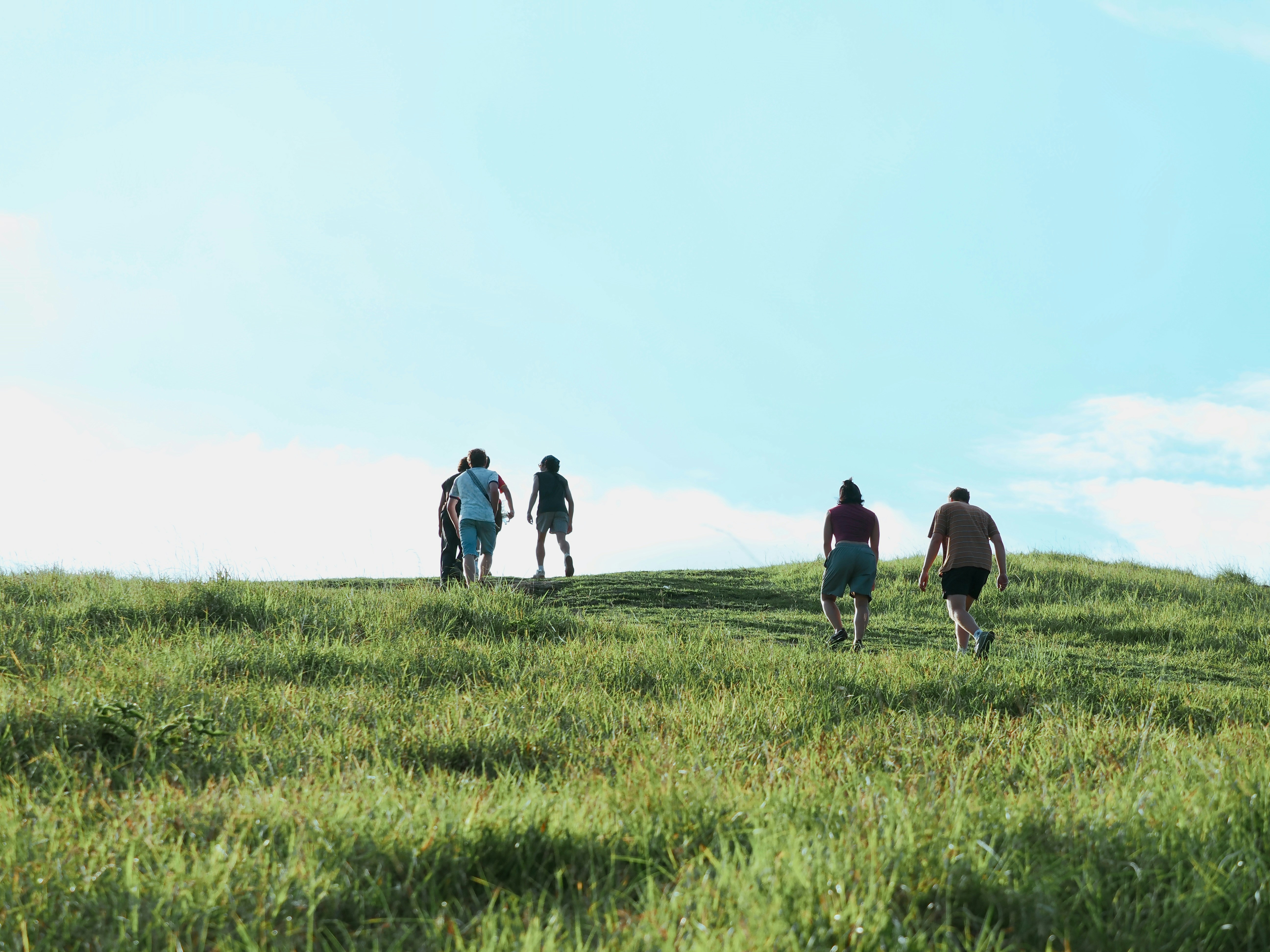 People walking on a hill